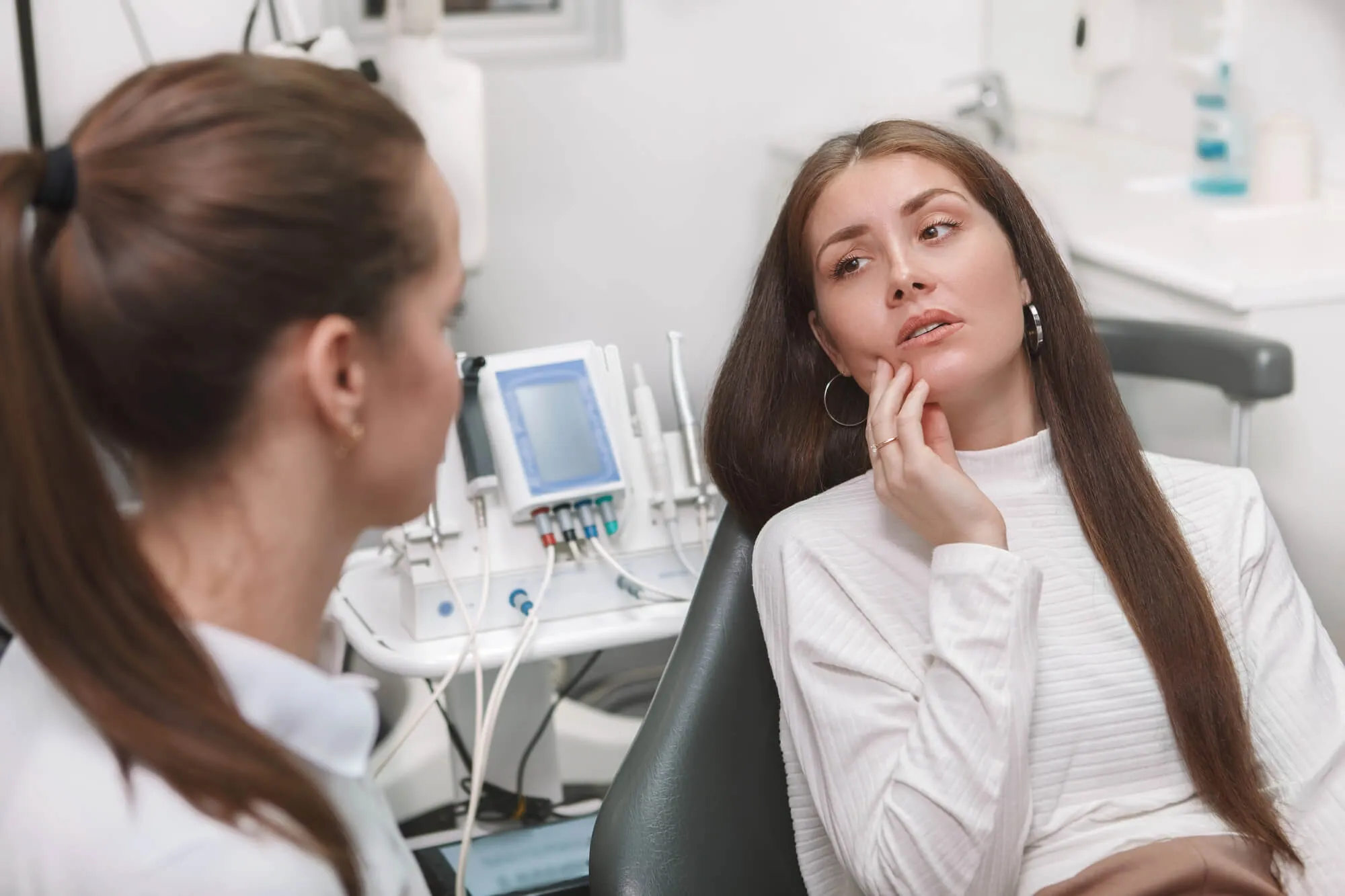 emergency-dentist-in-Mount-Holly-listening-to-her-patient