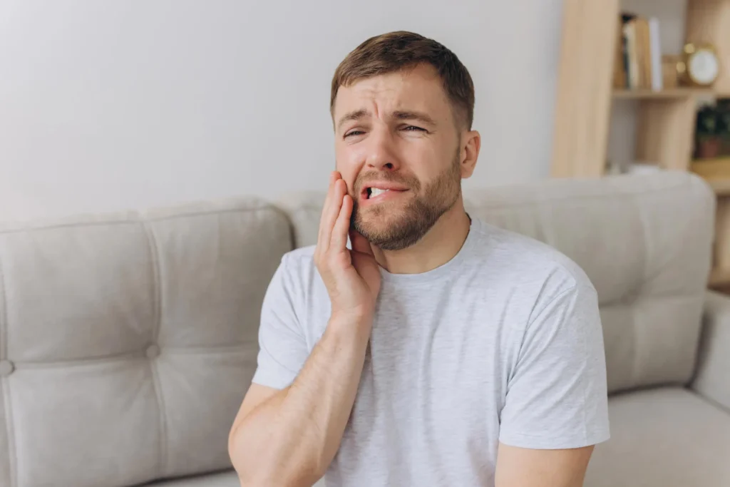 man-in-pain-needs-to-see-an-emergency-dentist-in-Mount-Holly