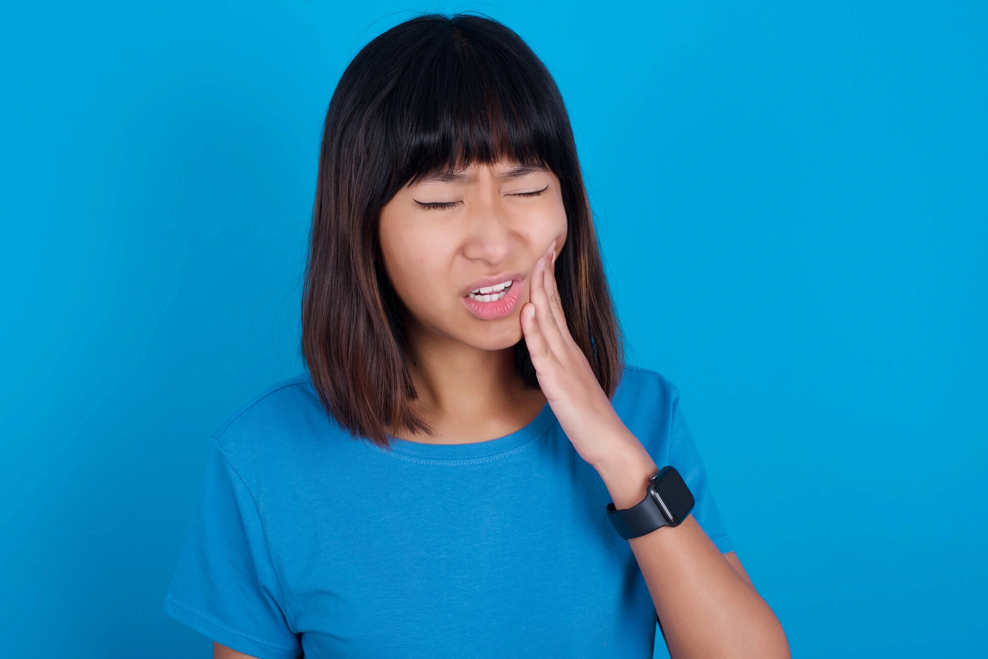 woman-needing-an-emergency-dentist-in-Mount-Holly