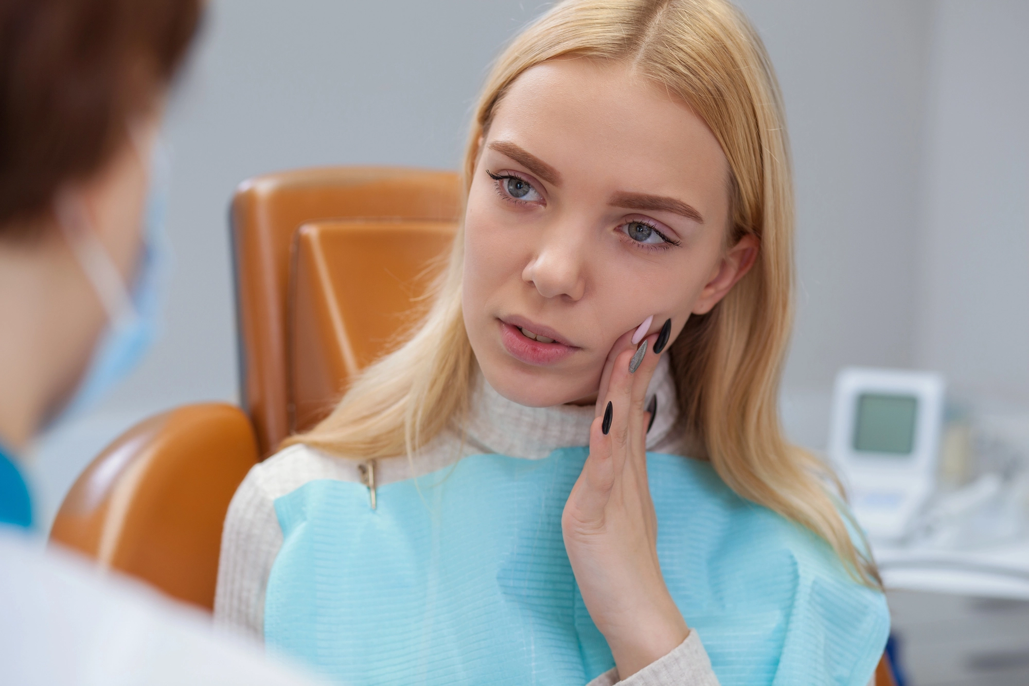 Patient-discussing-missing-teeth-implant-crowns-in-Mount-Holly